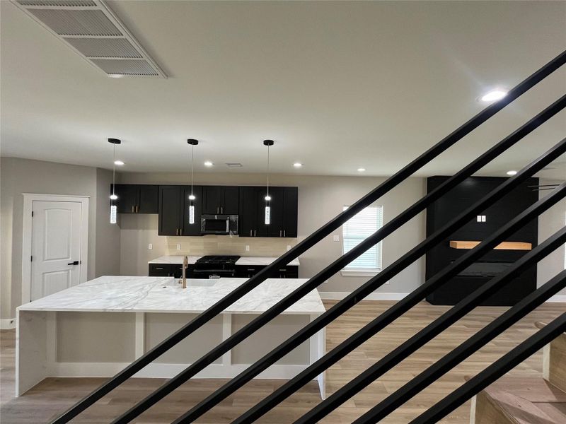 8010 Cora St custom wrought iron stair rails