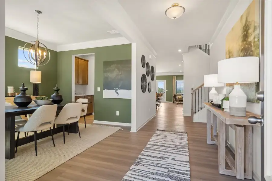 The James- Entry into Dining Room. Home under construction, sample image for illustration; upgrades, options, and colors may vary. The James- Entry into Dining Room. Home under construction, sample image for illustration; upgrades, options, and colors may vary.