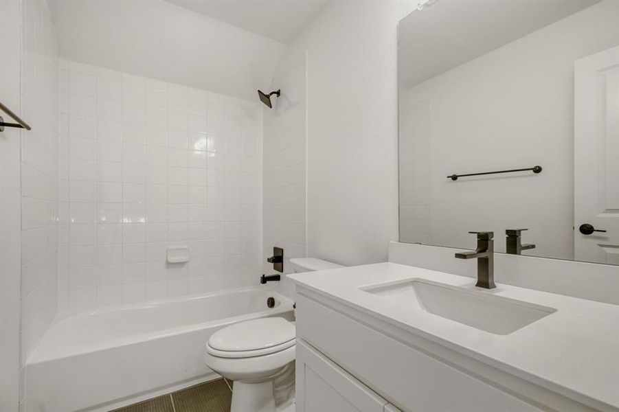 Full bathroom featuring shower / bathtub combination and vanity