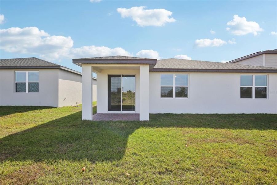 Exterior details and patio area of a home in Hamilton Bluff - Signature Series, Lake Hamilton (Image 26).