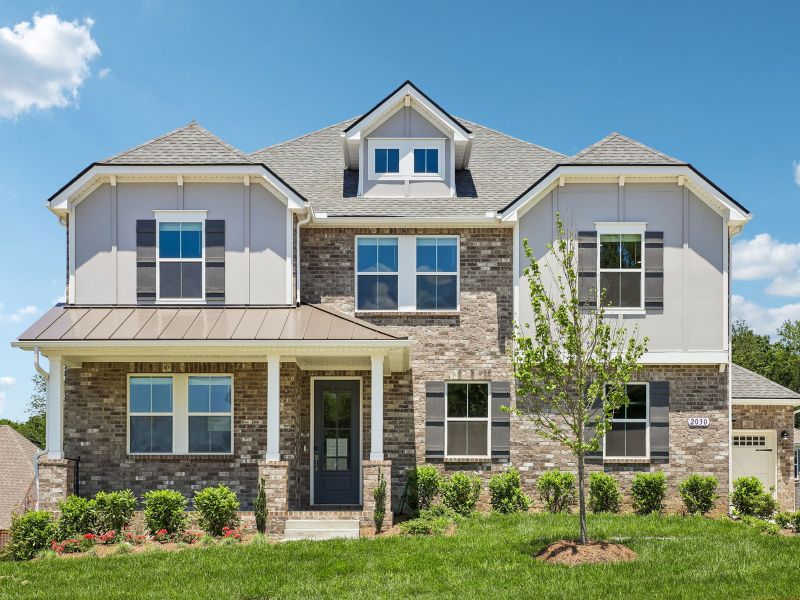 Front exterior of a new home in Station Hill - Estate Series, Franklin, TN, highlighting curb appeal (Image 1). Front exterior of a new home in Station Hill - Estate Series, Franklin, TN, highlighting curb appeal (Image 1).