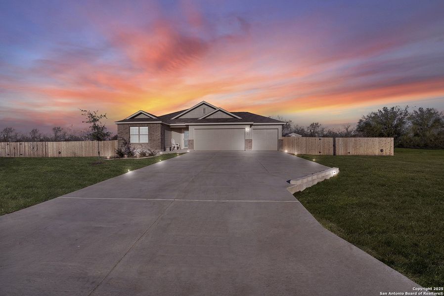 Front exterior of a new home in Chaparral Ranch, Floresville, TX, highlighting curb appeal (Image 24).