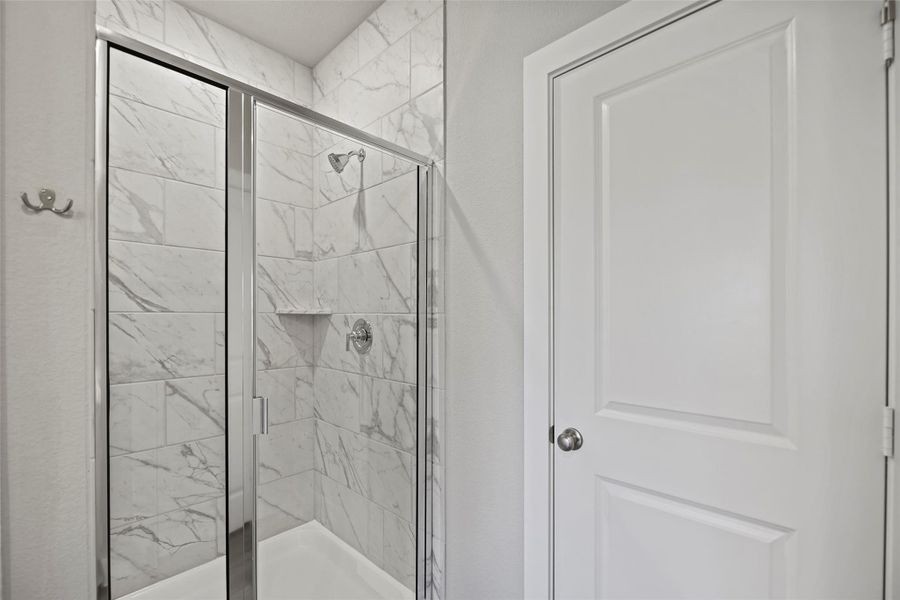 Elegant finishes and modern fixtures enhance the retreat-like feel.