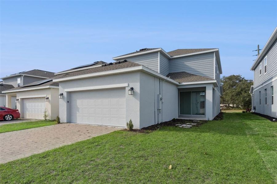 Front exterior of a new home in , St. Cloud, FL, highlighting curb appeal (Image 18). Front exterior of a new home in , St. Cloud, FL, highlighting curb appeal (Image 18).