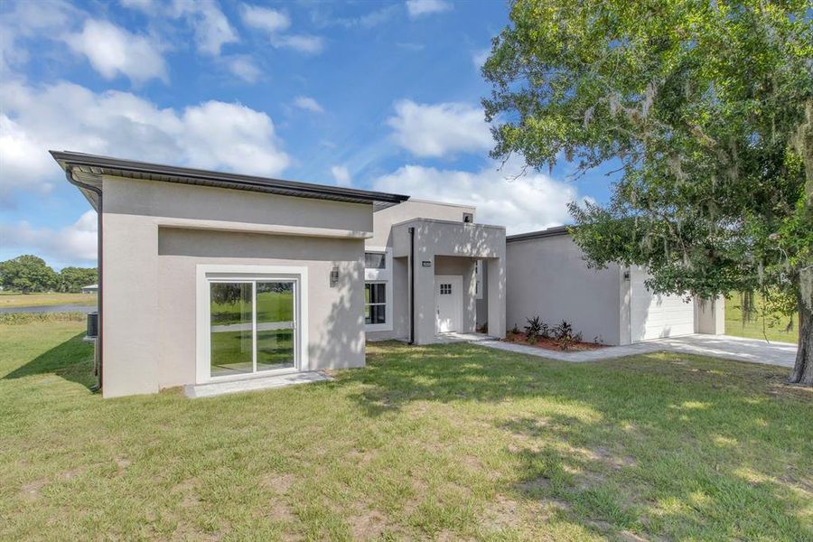 Front exterior of a new home in , Sebring, FL, highlighting curb appeal (Image 15).