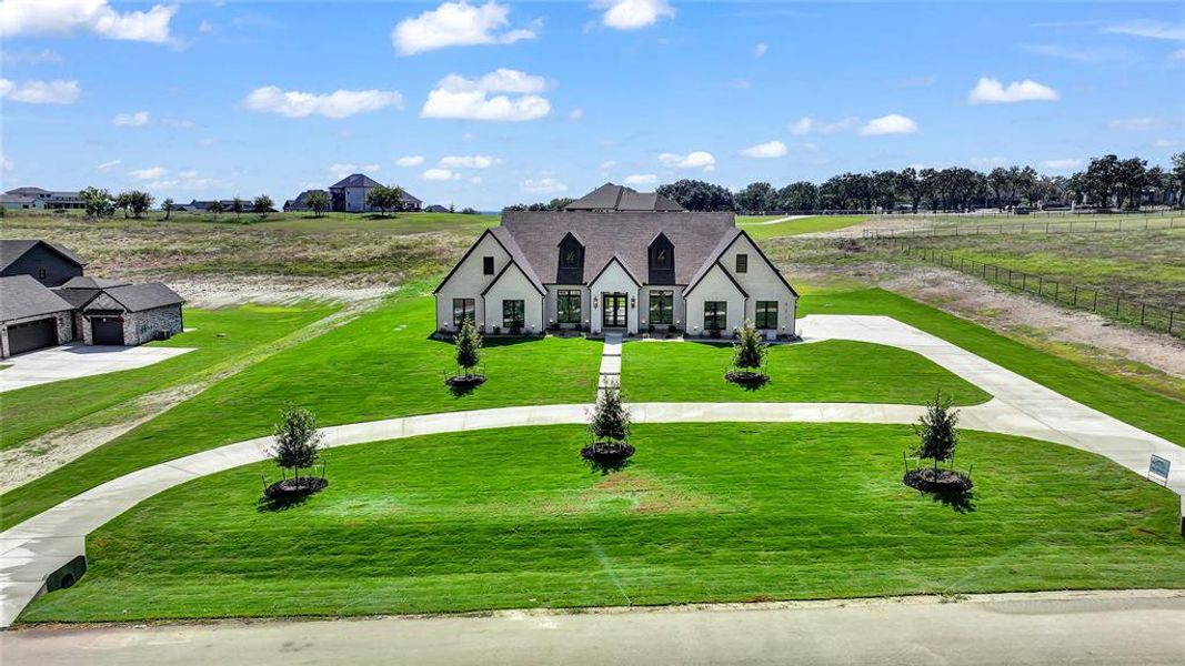 Front exterior of a new home in , Weatherford, TX, highlighting curb appeal (Image 2). Front exterior of a new home in , Weatherford, TX, highlighting curb appeal (Image 2).