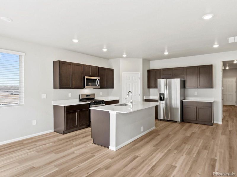 Furnished interior view inside a new home in Poudre Heights: The Lakes Collection, Windsor (Image 11).