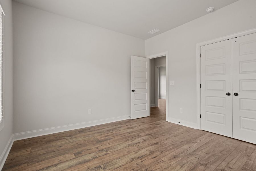 Spacious, unfurnished interior of a new home in Cherokee Knoll, Williamston (Image 24).