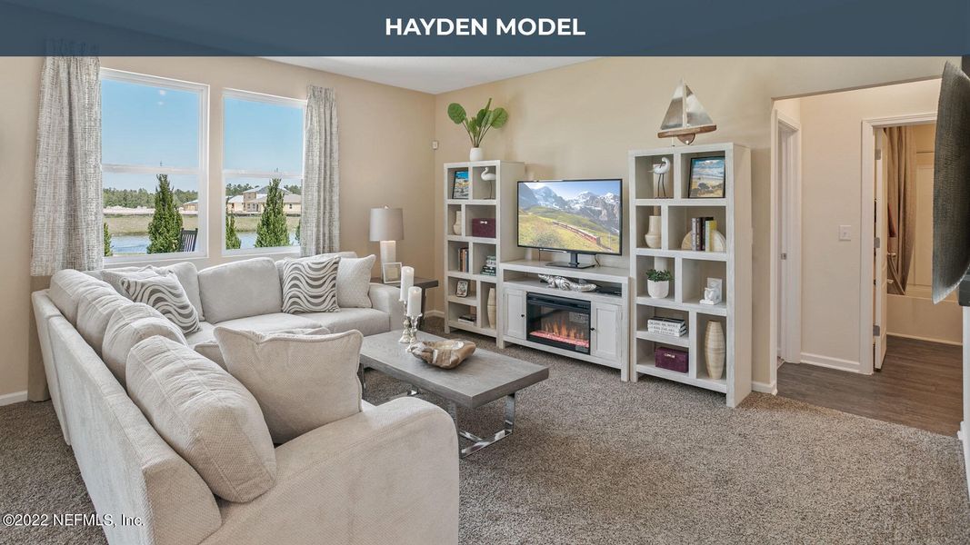 Furnished interior view inside a new home in Cross Creek Express, Green Cove Springs (Image 9).