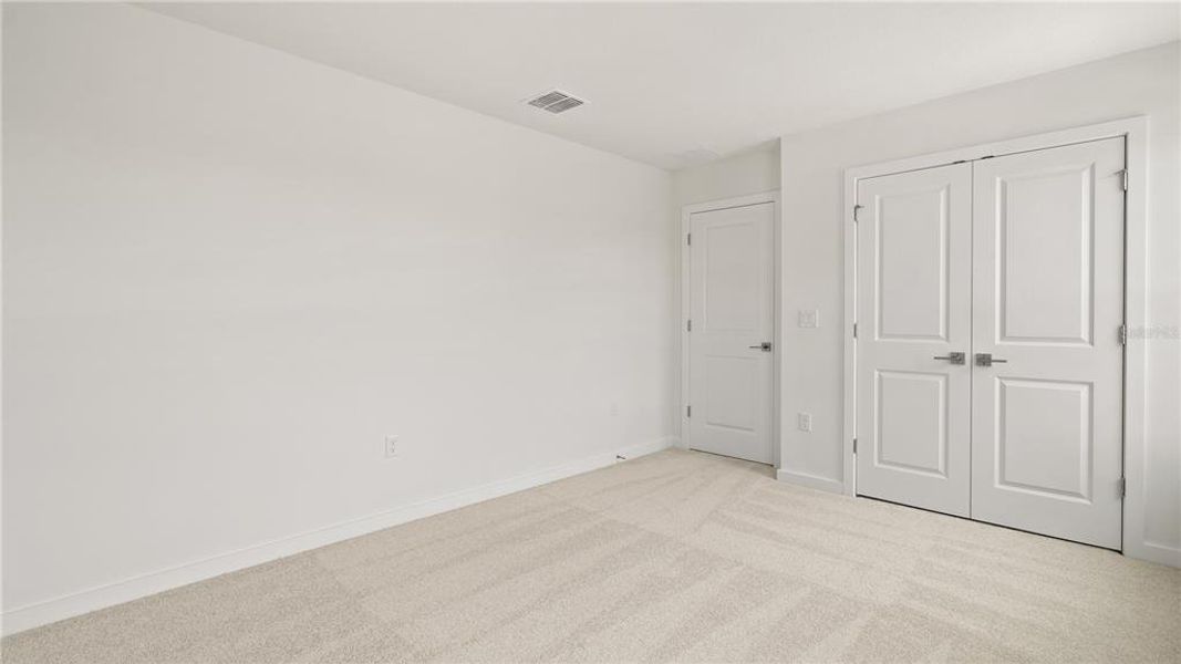 Spacious, unfurnished interior of a new home in Willowbrook North, Winter Haven (Image 35).