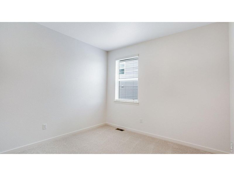 Spacious, unfurnished interior of a new home in Hansen Farm, Fort Collins (Image 31).