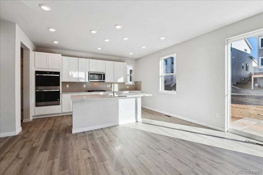 Furnished interior view inside a new home in Floret Collection at Alder Creek, Parker (Image 10). Furnished interior view inside a new home in Floret Collection at Alder Creek, Parker (Image 10).