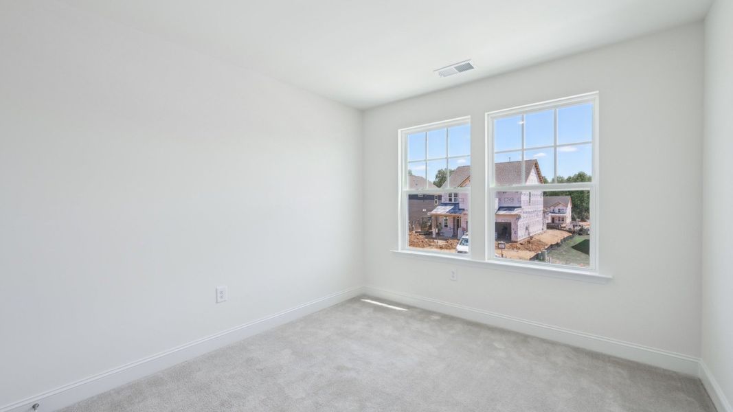Representative furnished interior of a home built from the Bordeaux by DRB Homes in Sidney Creek Single Family, Zebulon (Image 26).