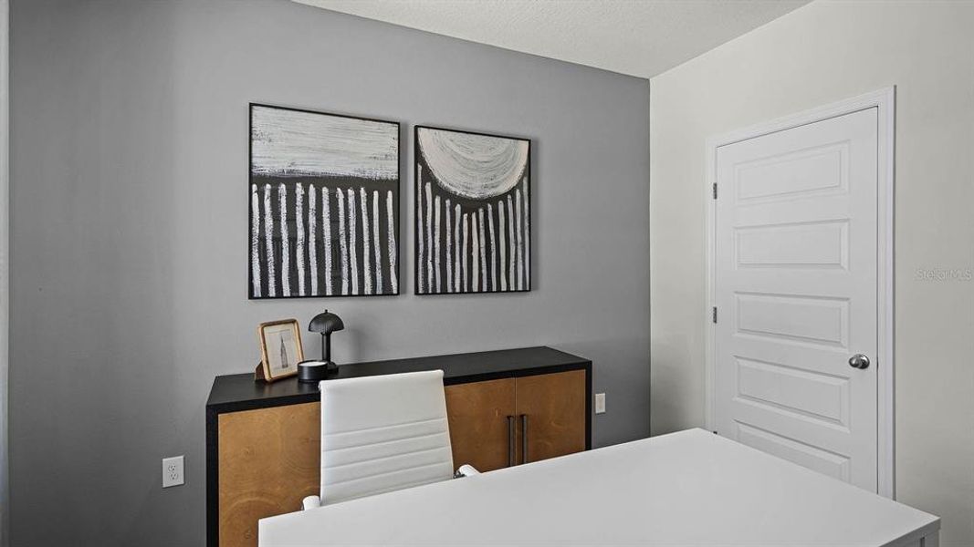 Furnished interior view inside a new home in Lake Deer Estates, Poinciana (Image 25).