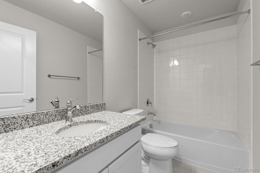 Furnished interior view inside a new home in The Villas Collection at Sterling Ranch, Littleton (Image 8).