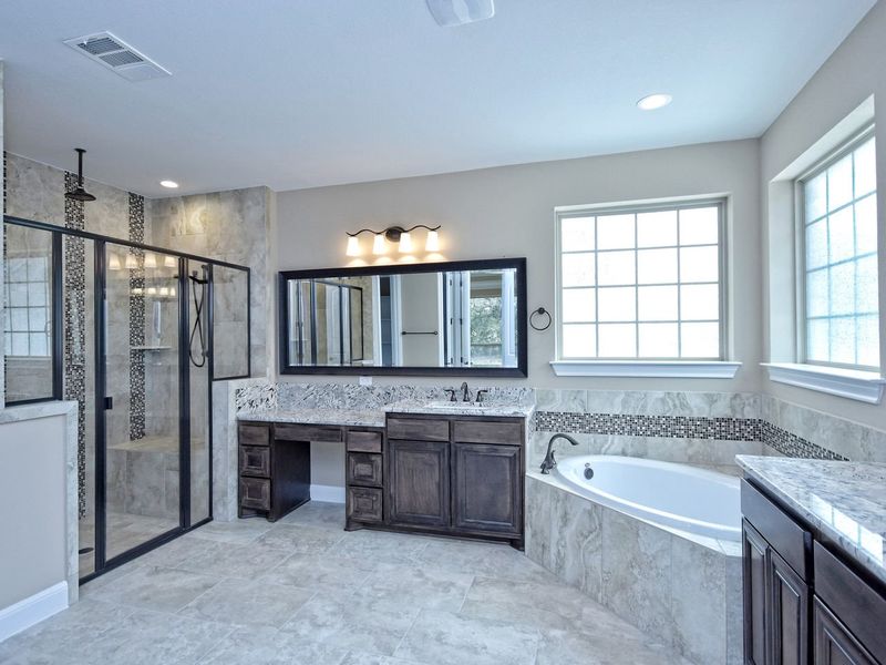 Representative furnished interior of a home built from the Madera II by Giddens Homes in Scofield Farms Estates, Georgetown (Image 246).