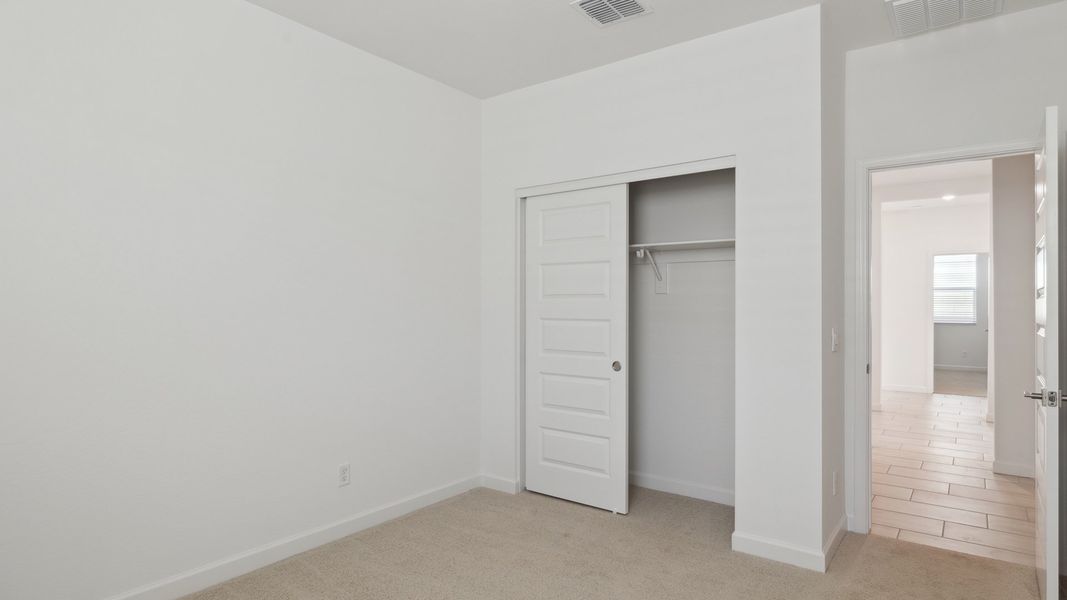 Representative unfurnished interior of a home built from the Cobalt by D.R. Horton in Zanjero Pass, Glendale (Image 23).