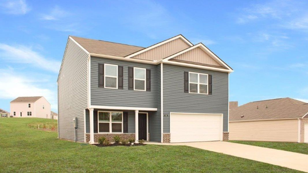 Front exterior of a new home in Crescent Ridge, Niota, TN, highlighting curb appeal (Image 2). Front exterior of a new home in Crescent Ridge, Niota, TN, highlighting curb appeal (Image 2).