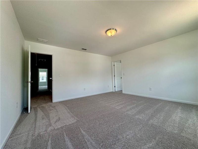 Spacious, unfurnished interior of a new home in Eastlyn Crossing - Single Family, Flowery Branch (Image 37). Spacious, unfurnished interior of a new home in Eastlyn Crossing - Single Family, Flowery Branch (Image 37).