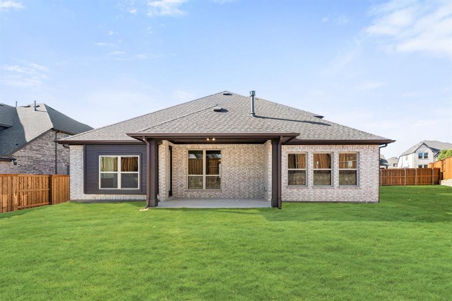 Exterior details and patio area of a home in Windsong Ranch, Prosper (Image 3).