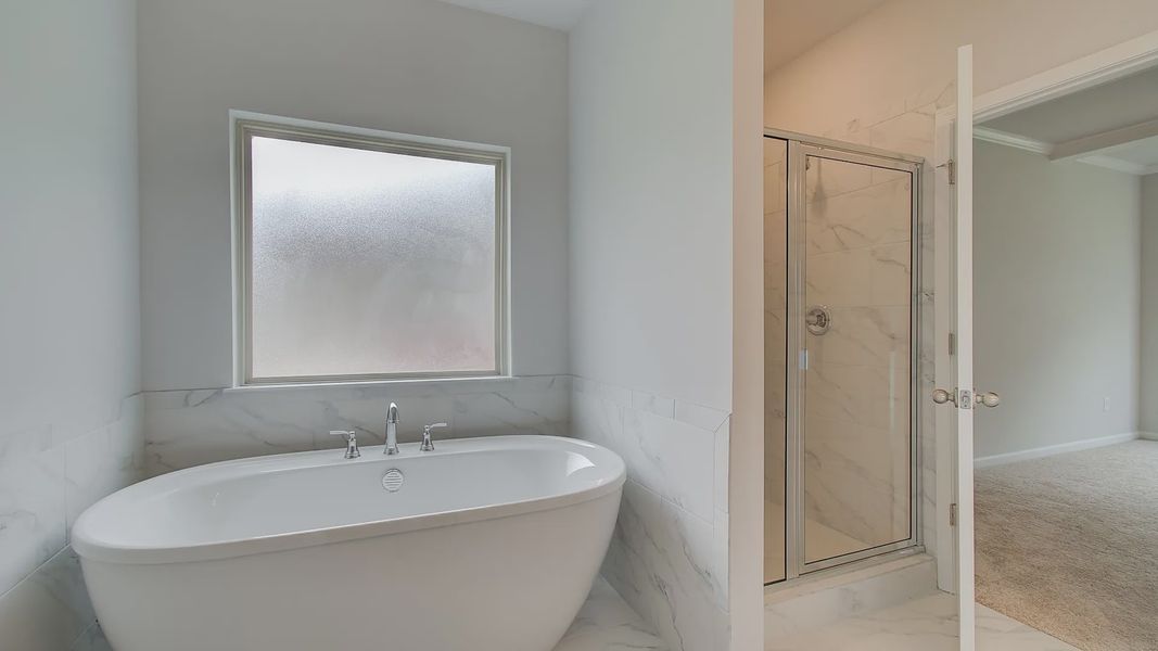 Representative furnished interior of a home built from the Meridian II by DRB Homes in Northcroft, Loganville (Image 19).