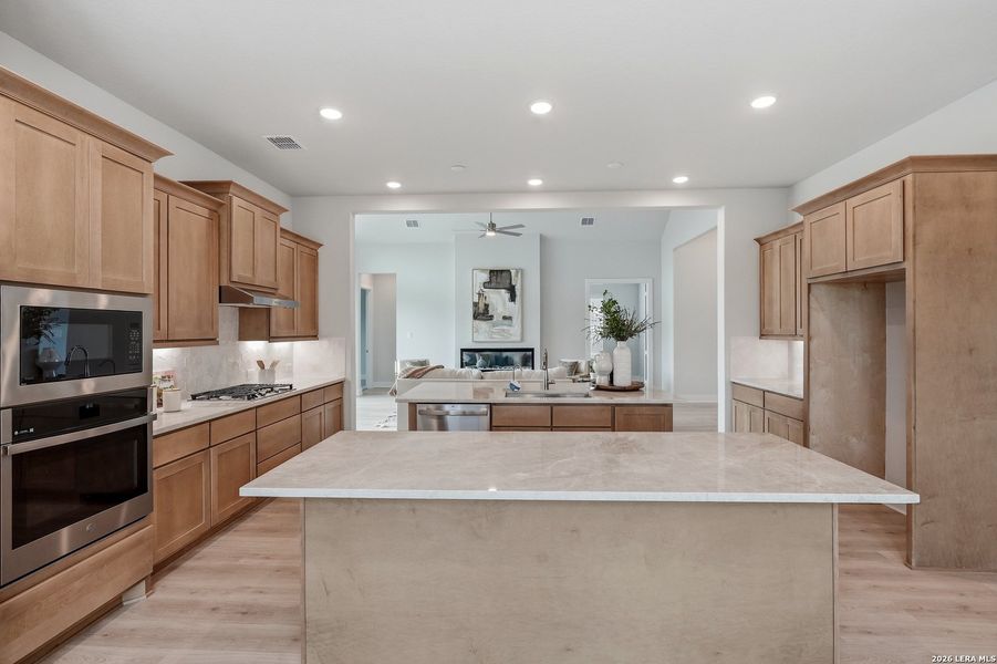 Furnished interior view inside a new home in Potranco Oaks, Castroville (Image 10).