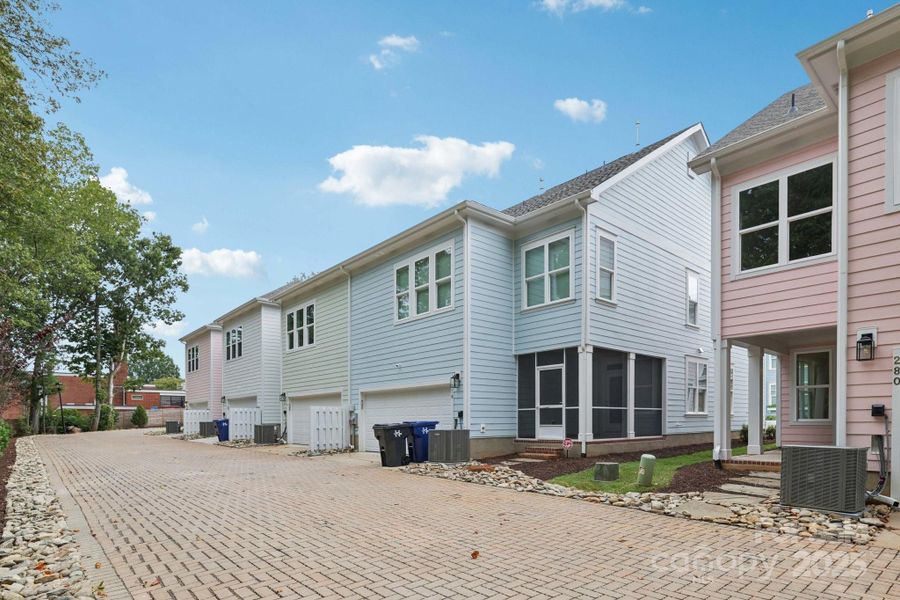 Exterior details and patio area of a home in Walk23, Huntersville (Image 21).