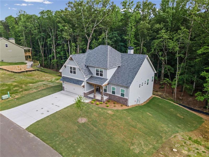 Front exterior of a new home in , Waleska, GA, highlighting curb appeal (Image 27).