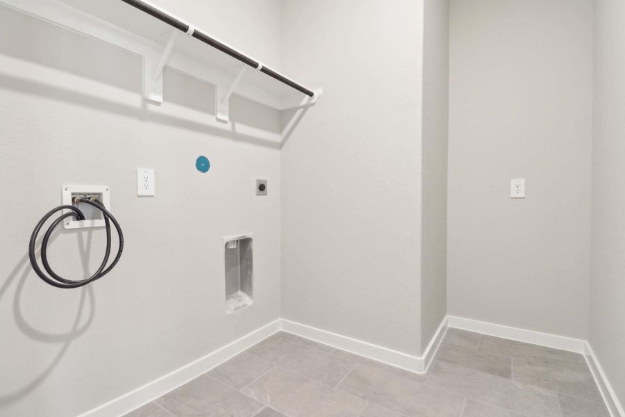 Furnished interior view inside a new home in Massey Oaks - Premier Series, Pearland (Image 4).