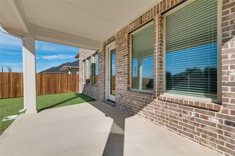Exterior details and patio area of a home in Walden Pond, Forney (Image 4).