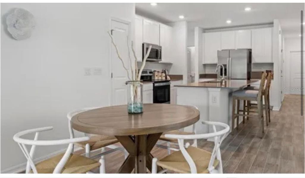 Furnished interior view inside a new home in Cascades: Legacy Collection, Davenport (Image 9).