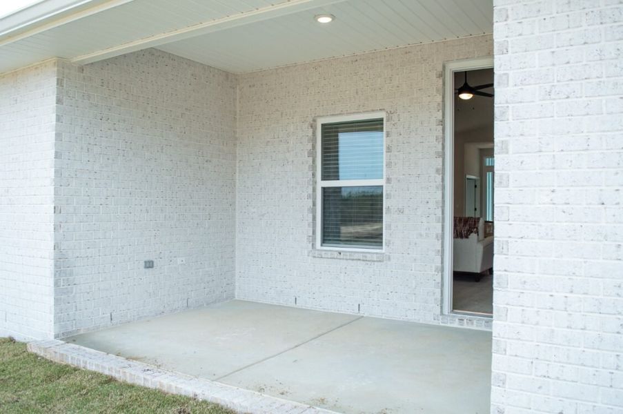 Exterior details and patio area of a home in Parkland Place, Pace (Image 3).
