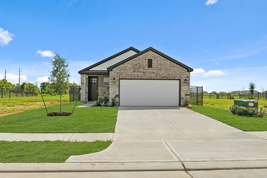 Front exterior of a new home in River Ranch Trails, Dayton, TX, highlighting curb appeal (Image 22). Front exterior of a new home in River Ranch Trails, Dayton, TX, highlighting curb appeal (Image 22).
