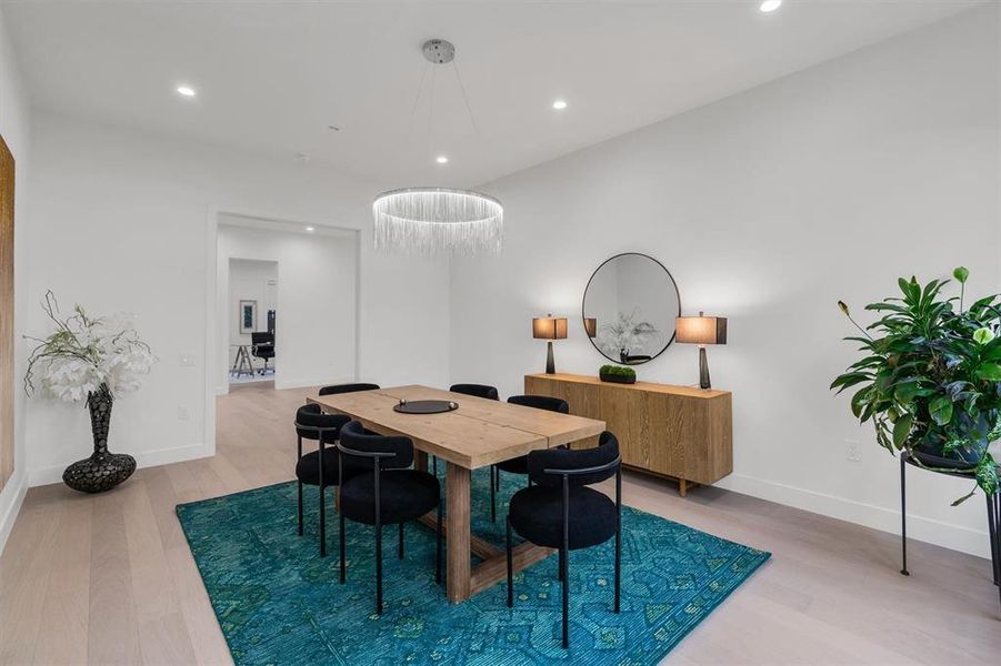 Dining space with light wood-type flooring