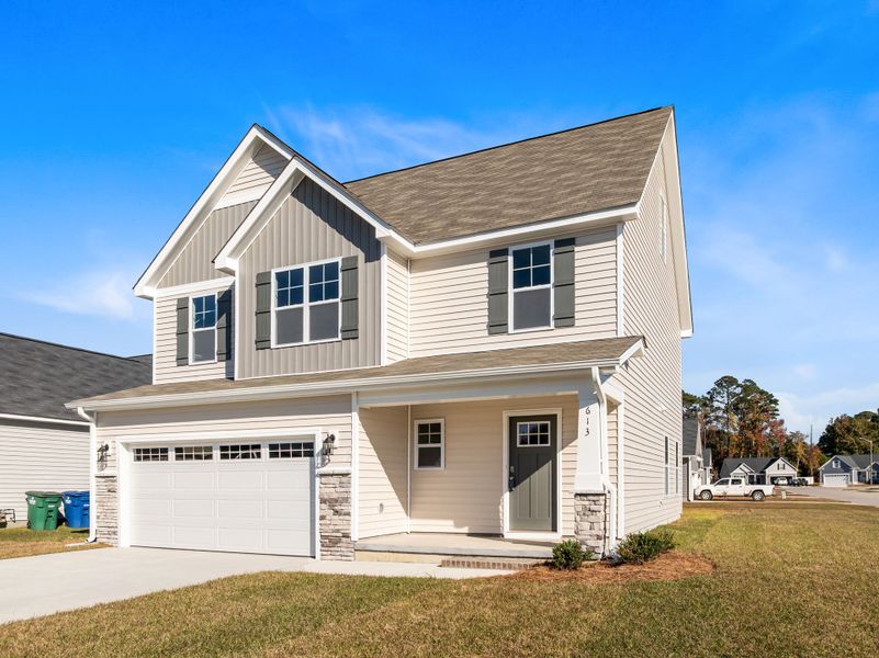 Front exterior of a new home in Arbor Hills South, Greenville, NC, highlighting curb appeal (Image 2).