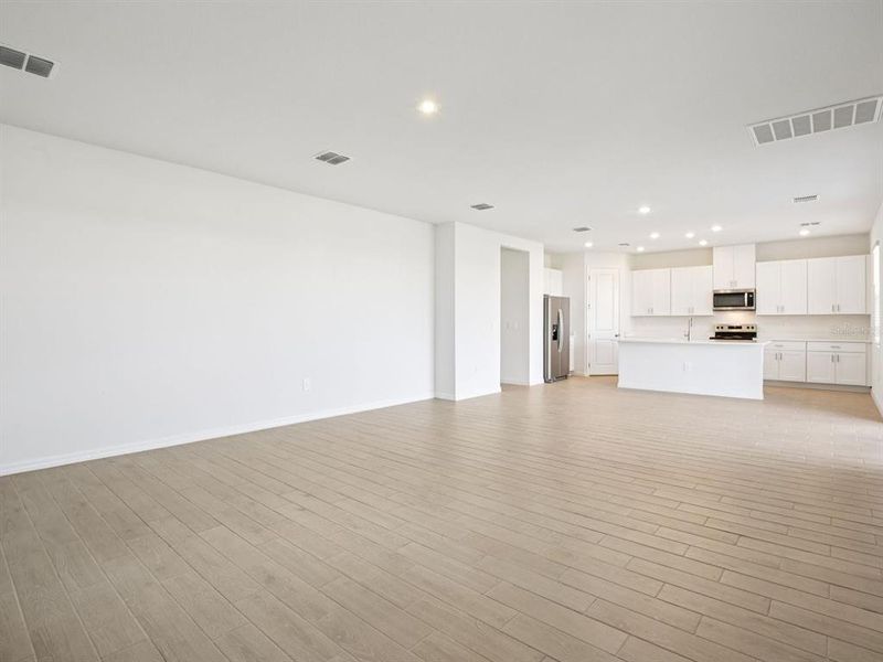 Spacious, unfurnished interior of a new home in Coasterra - Reserve Series, Palmetto (Image 18).