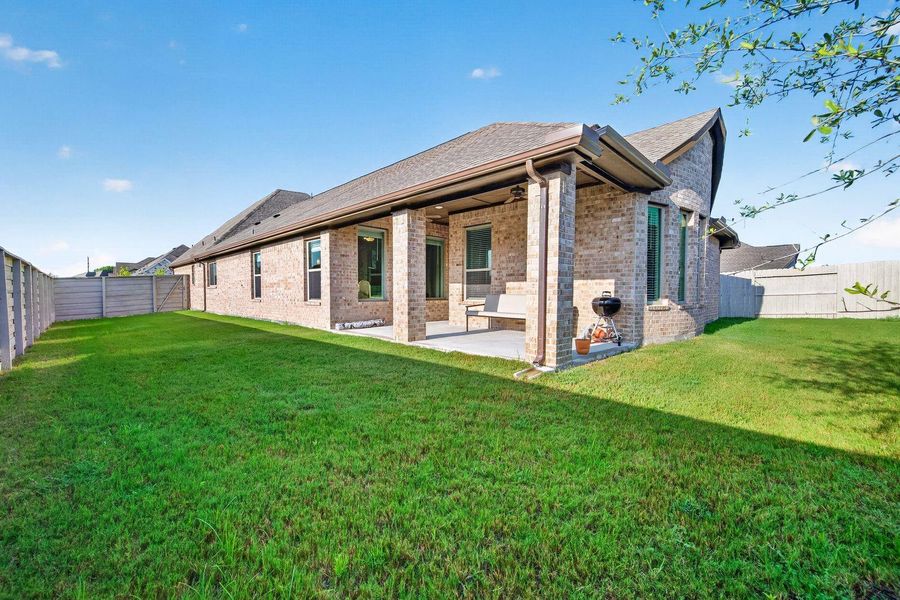 Exterior details and patio area of a home in Pomona, Manvel (Image 21).