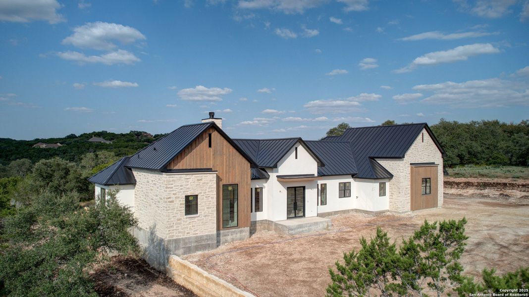 Front exterior of a new home in , New Braunfels, TX, highlighting curb appeal (Image 7). Front exterior of a new home in , New Braunfels, TX, highlighting curb appeal (Image 7).