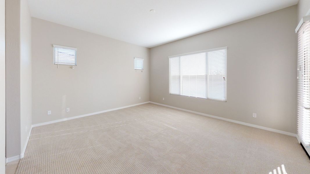 Representative furnished interior of a home built from the Benissa by DRB Homes in Windrose, Waddell (Image 18).