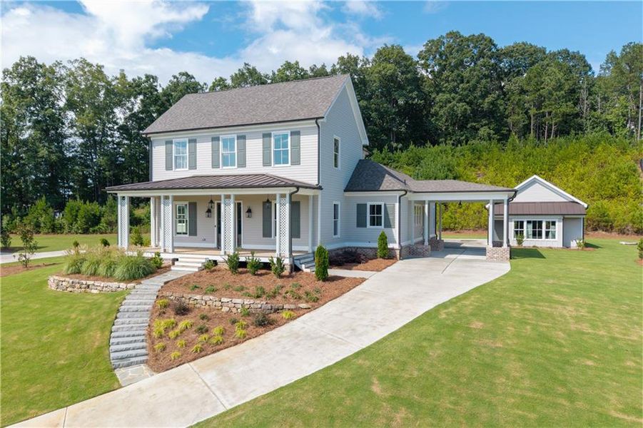Front exterior of a new home in Crossroads, Alpharetta, GA, highlighting curb appeal (Image 30).
