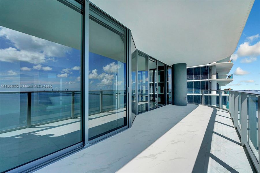 Exterior details and patio area of a home in Aria Reserve, Miami (Image 3).