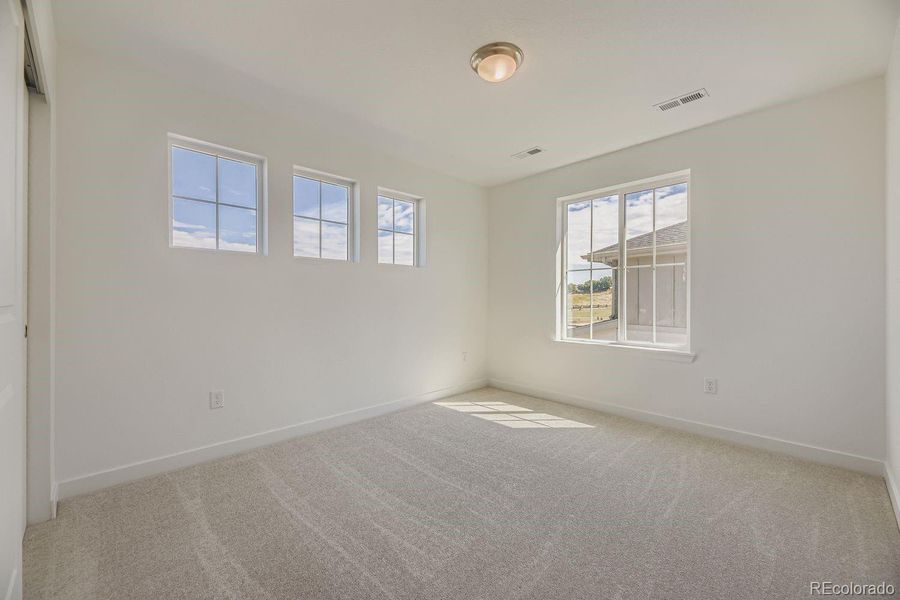 Spacious, unfurnished interior of a new home in Ken-Caryl Ranch: The Monarch Collection, Littleton (Image 9).