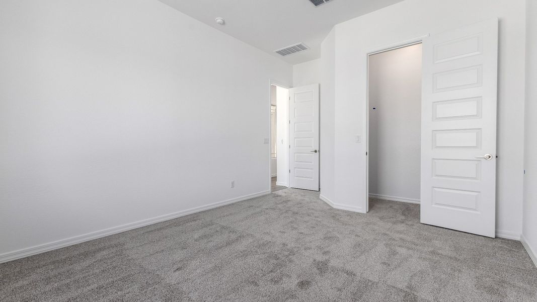 Representative furnished interior of a home built from the Granada by DRB Homes in Windrose, Waddell (Image 32).