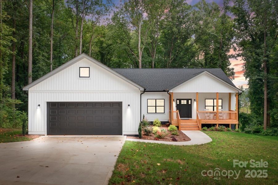 Front exterior of a new home in , Statesville, NC, highlighting curb appeal (Image 1).