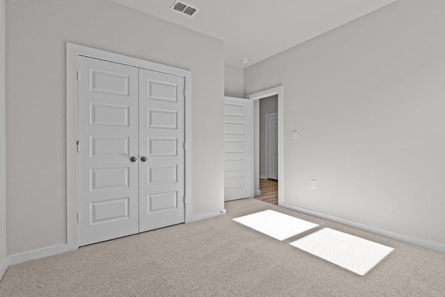 A room with white doors.
