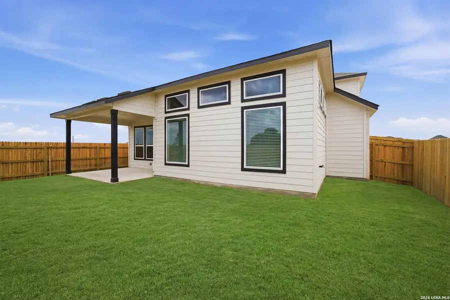 Exterior details and patio area of a home in Megan's Landing, Castroville (Image 3).