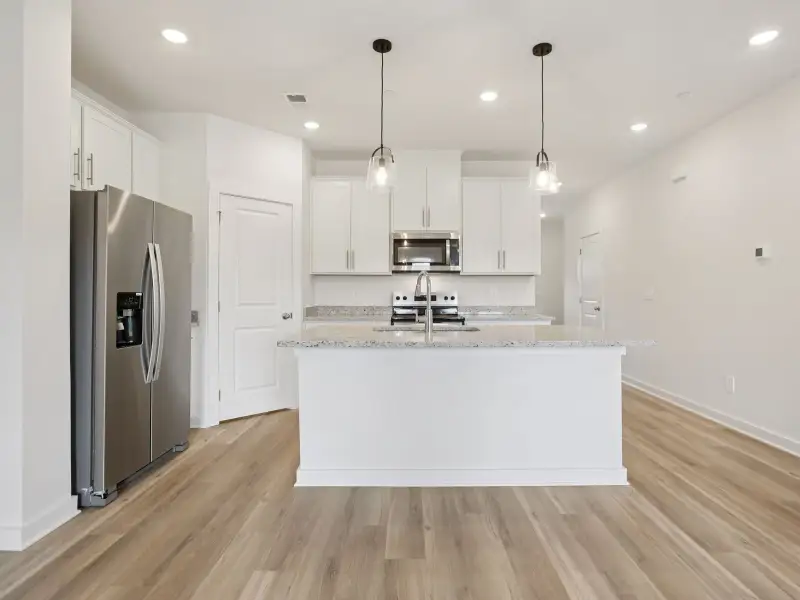 Furnished interior view inside a new home in Cedarcrest Townhomes, Fairview (Image 3).