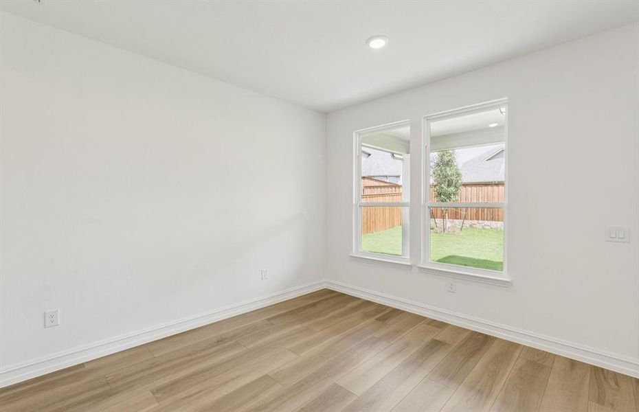 Sunlit gathering room designed for relaxation and entertainment Sunlit gathering room designed for relaxation and entertainment