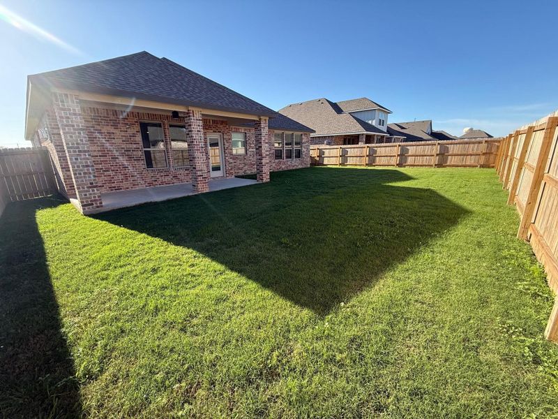 Exterior details and patio area of a home in Wellborn Settlement, College Station (Image 3).