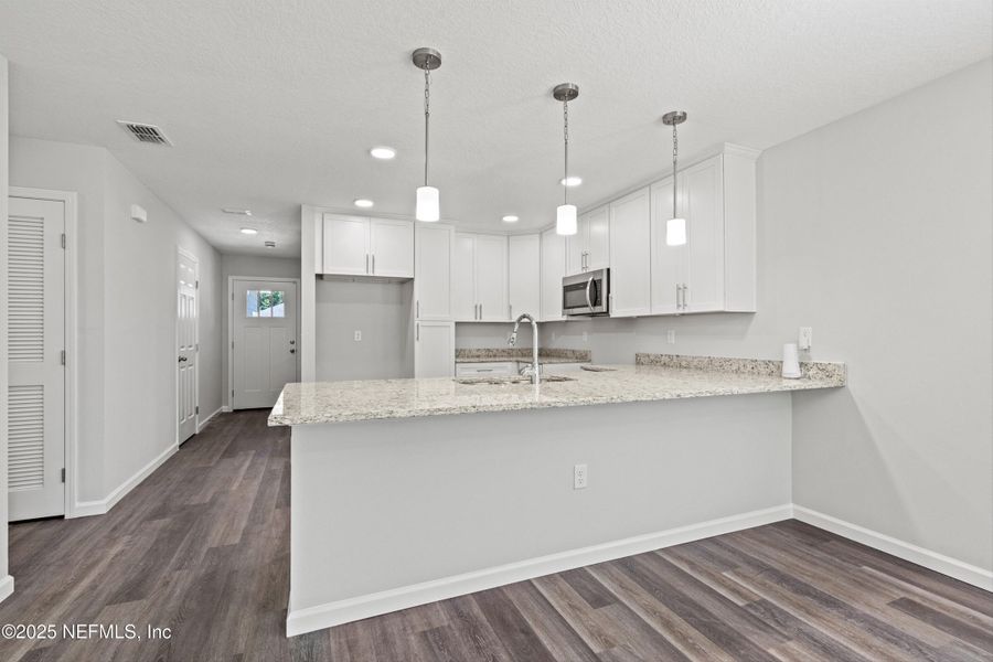 Furnished interior view inside a new home in , Jacksonville (Image 11).